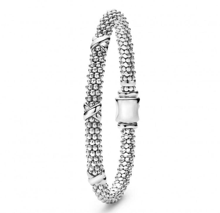 Sterling silver textured station bracelet.