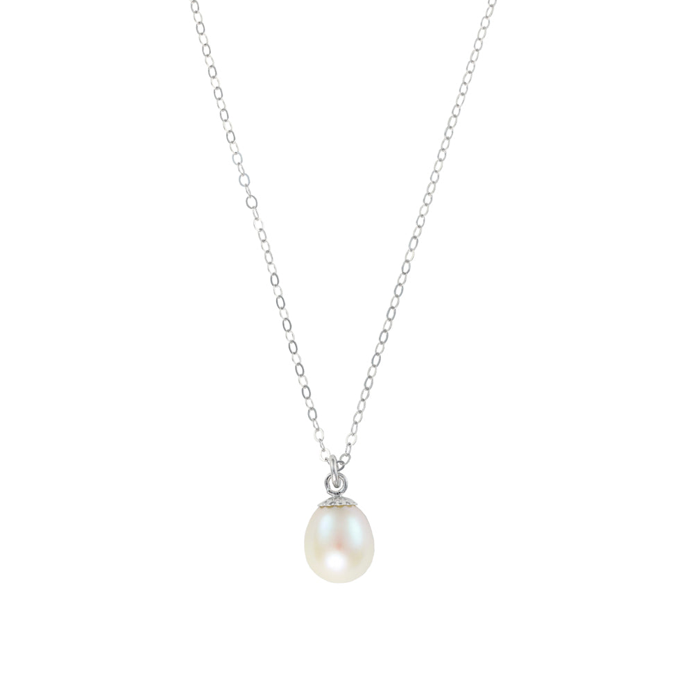 Cream pearl pendant on white gold chain.