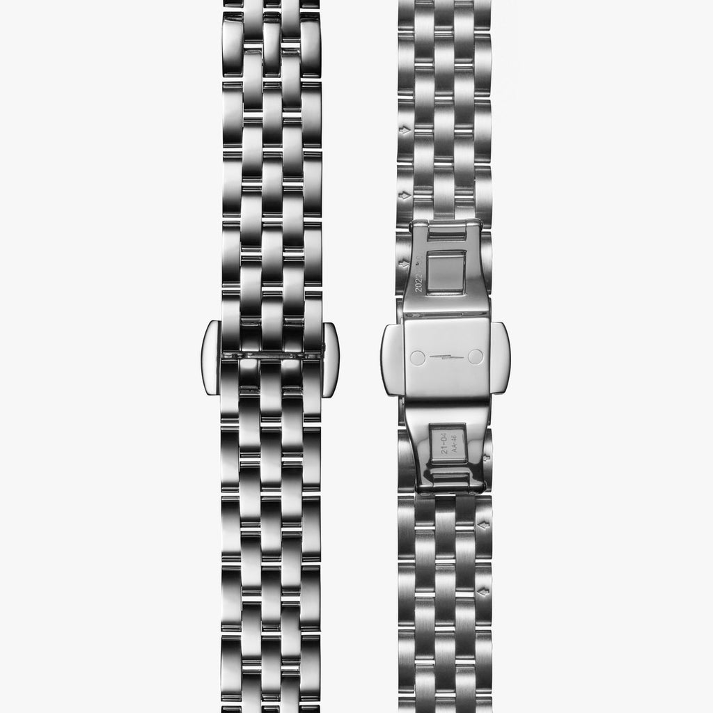 Stainless steel watch band with clasp.