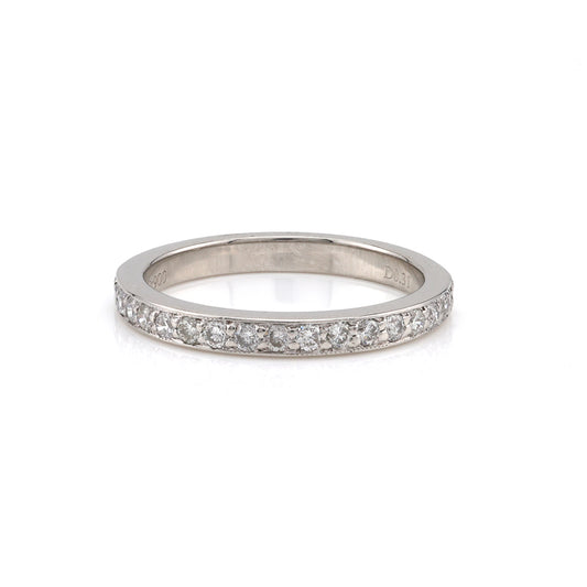 Platinum band with round diamonds.