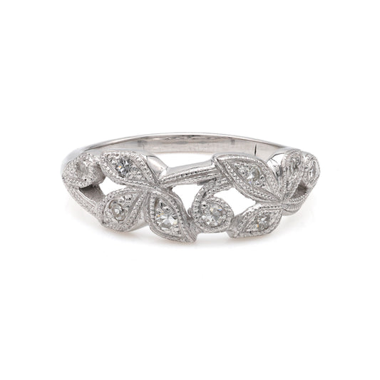 Platinum ring with leaf diamond design.