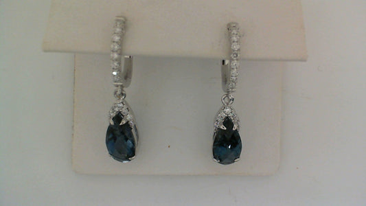 Pear-shaped blue topaz earrings with diamonds.