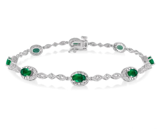 Fancy Link Color Gemstone Bracelet in 10 Karat White with 8 Oval Emeralds 5mm
