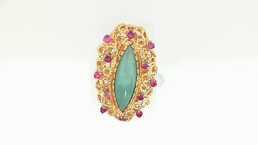 14K gold pin with jade and rubies.