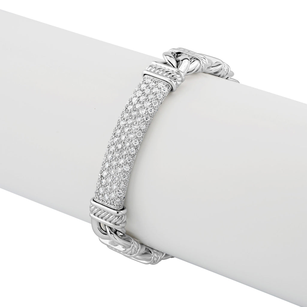 18K white gold bracelet with round diamonds.