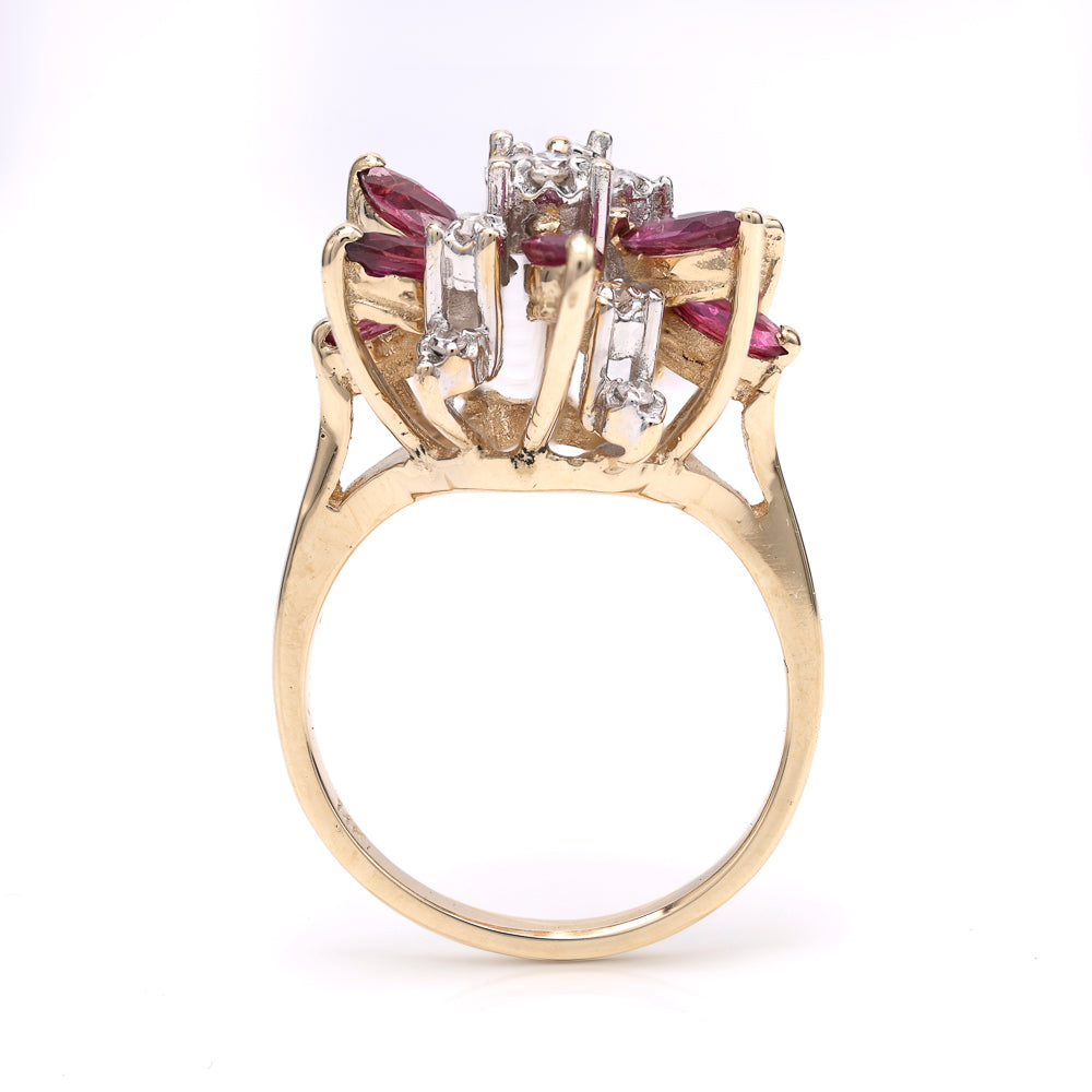 14K gold ring with marquise rubies.