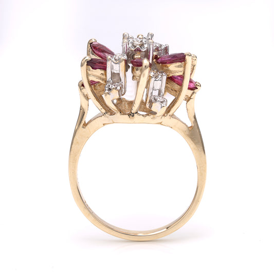 14K gold ring with marquise rubies.
