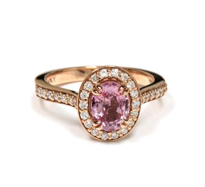 Oval pink sapphire, diamond halo, rose gold ring.