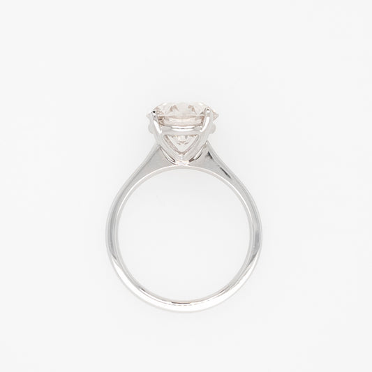 Solitaire lab-grown diamond engagement ring.