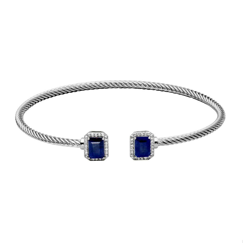 Sterling silver cuff with blue sapphires.