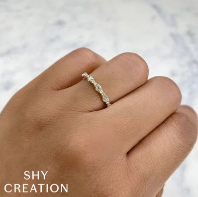 14K white gold ring with round diamonds.