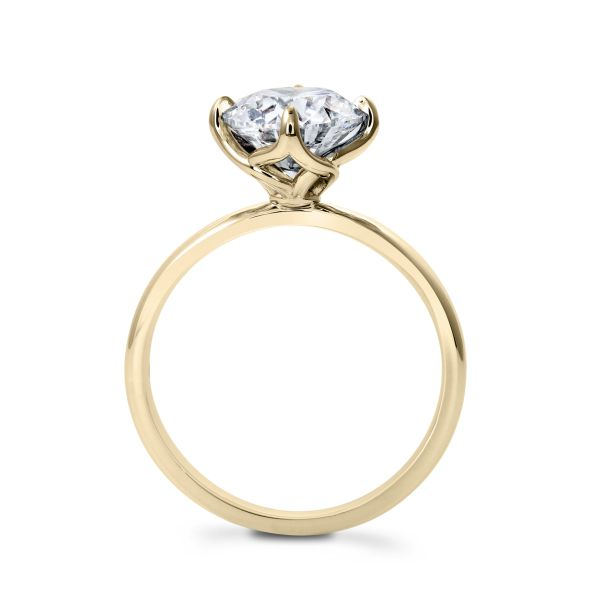 18K yellow gold solitaire diamond ring.