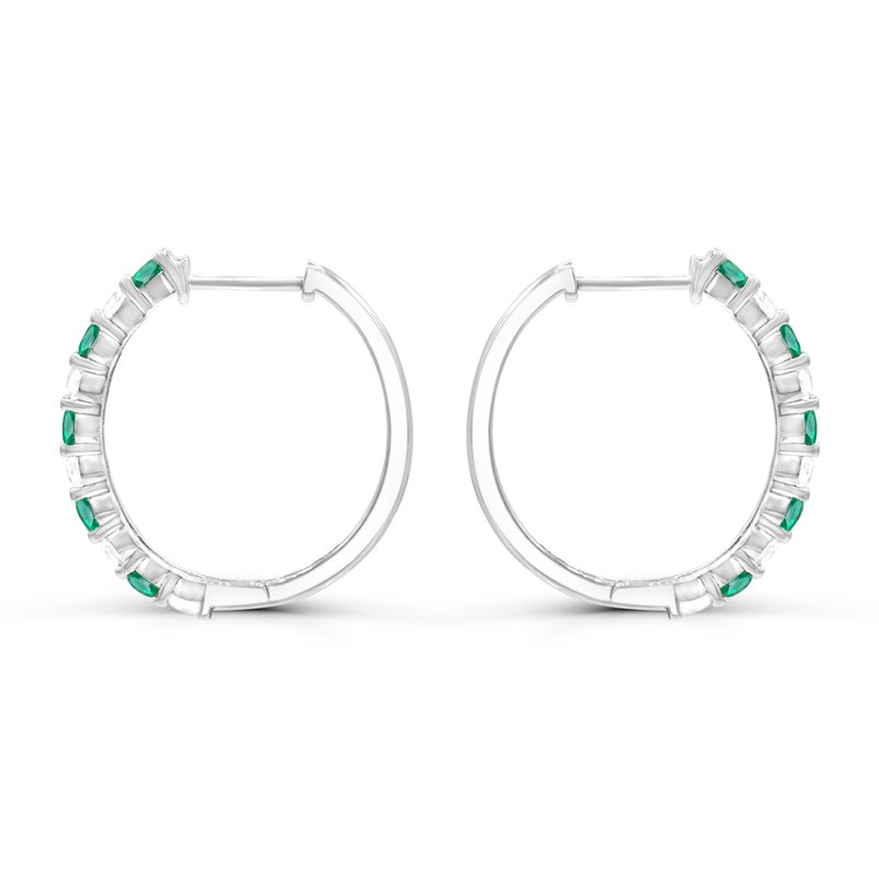 Sterling silver hoops with simulated emeralds.