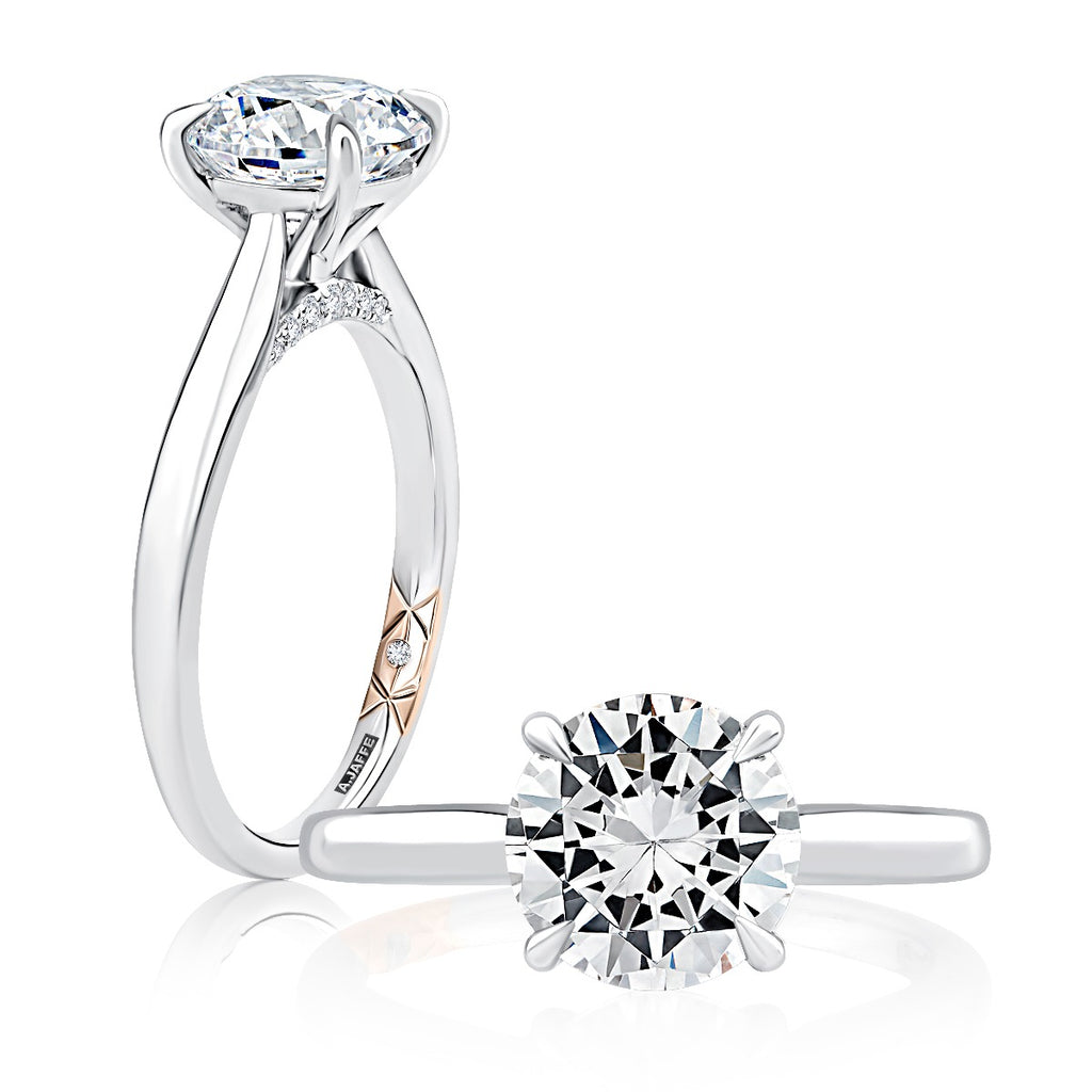 14K white gold ring with round diamond.