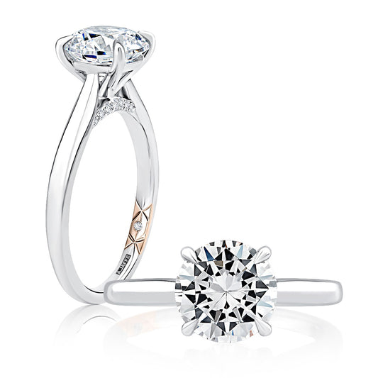 14K white gold ring with round diamond.