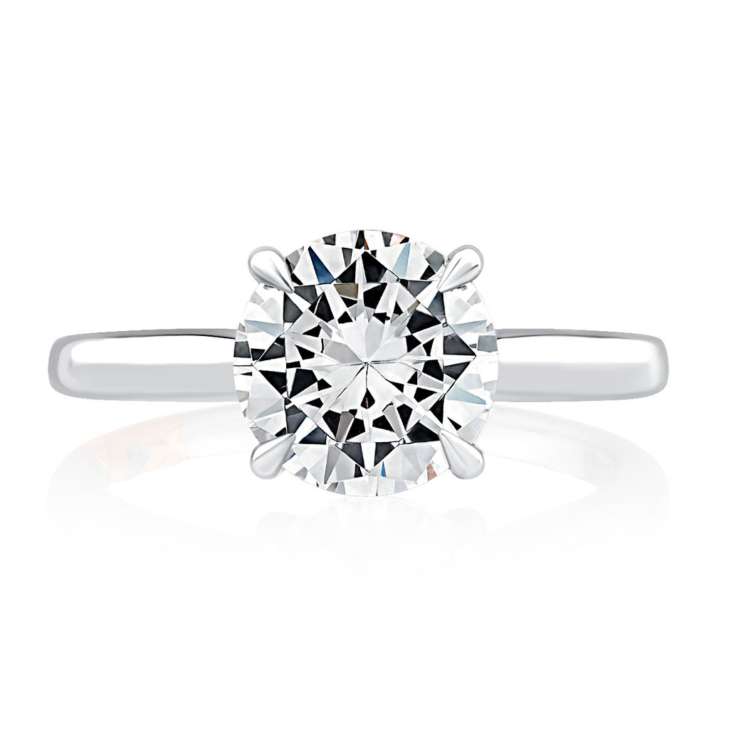 14K white gold solitaire diamond ring.