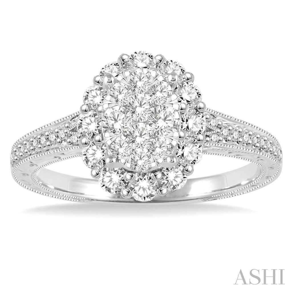 Vintage halo diamond ring in white gold.