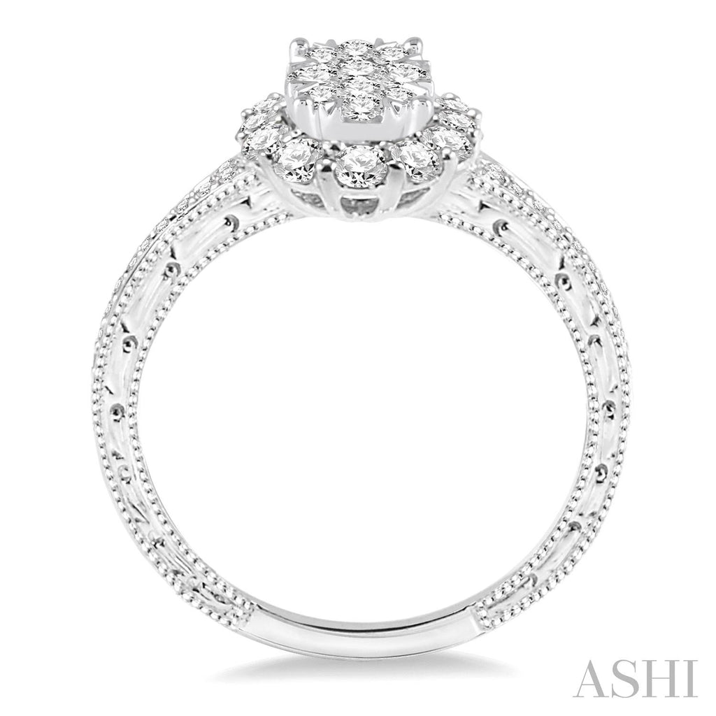 Vintage halo diamond ring in white gold.