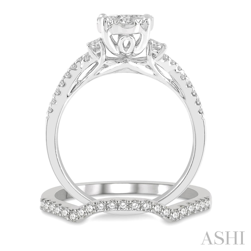 14K white gold diamond cluster engagement ring.