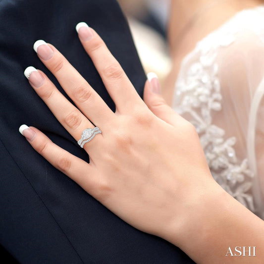 White gold diamond cluster engagement ring.