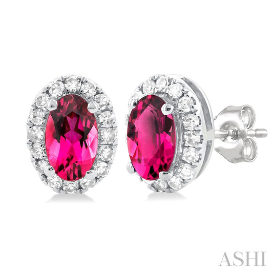 Oval pink tourmaline earrings with diamonds.
