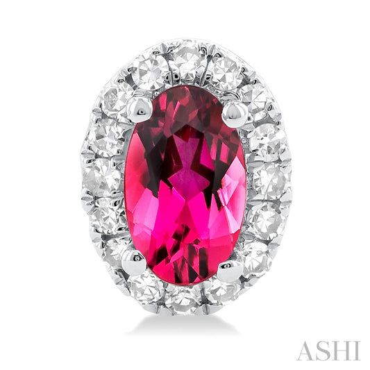 Oval pink tourmaline with diamond halo.