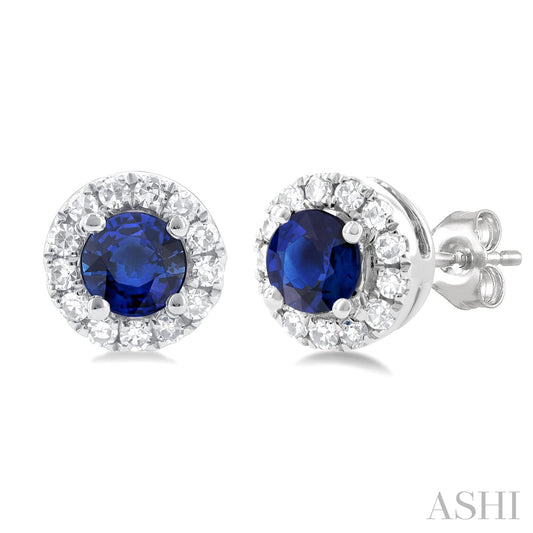 Sapphire and diamond stud earrings in white gold.