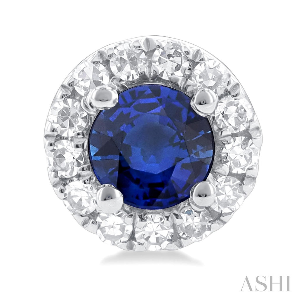 Sapphire stud earrings with diamond halo.