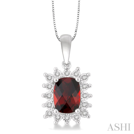 Cushion garnet pendant with diamond accents.