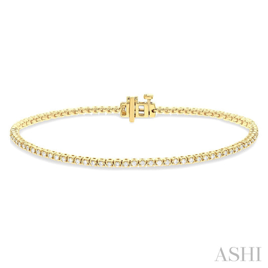 Yellow gold diamond tennis bracelet with clasp.