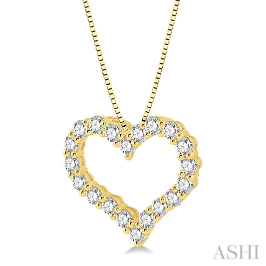Heart-shaped diamond necklace in yellow gold.