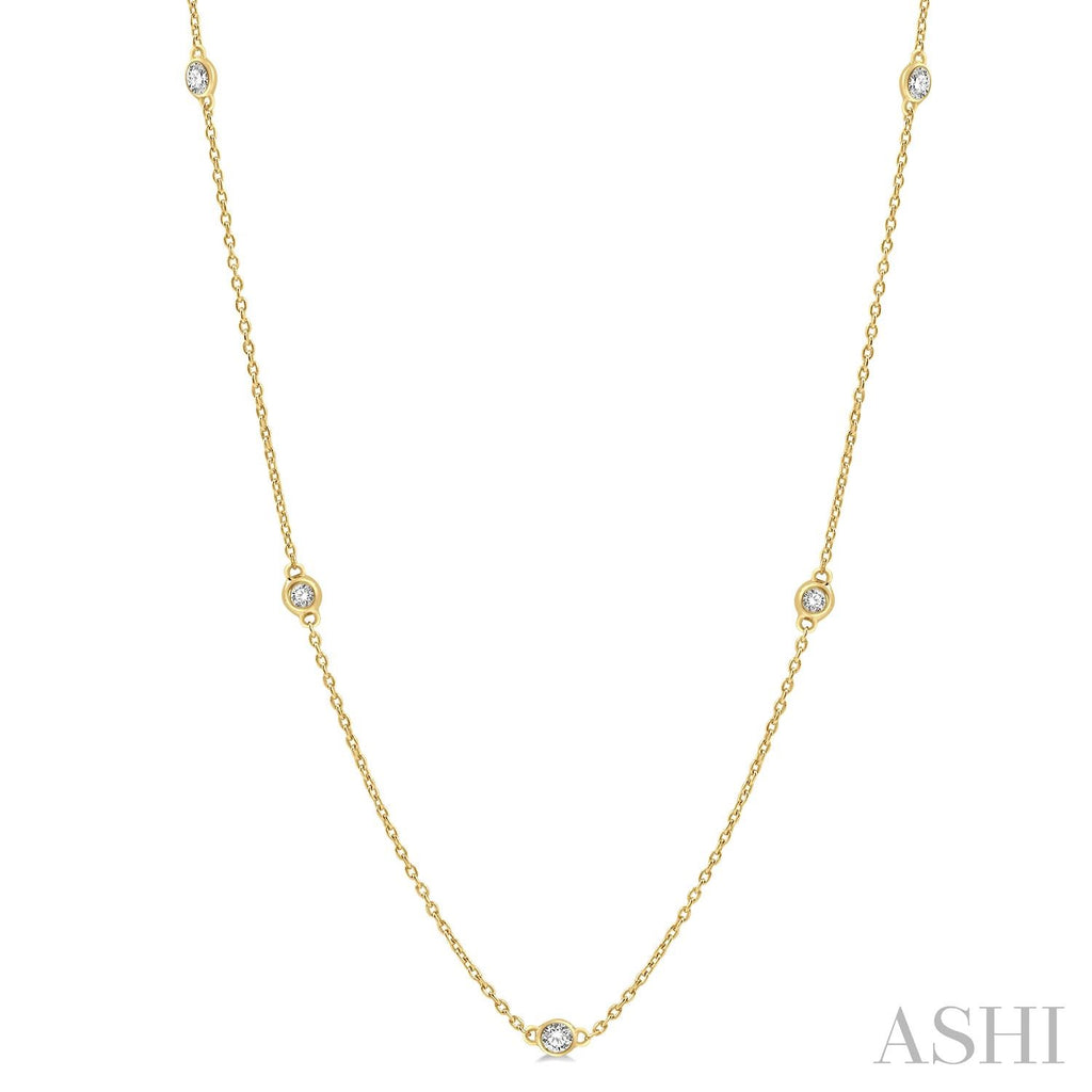 14K yellow gold necklace with round diamonds.