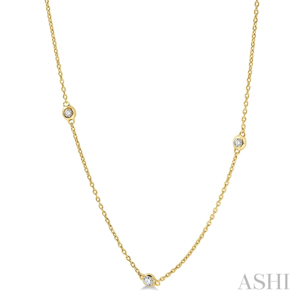 Yellow gold necklace with round diamonds.