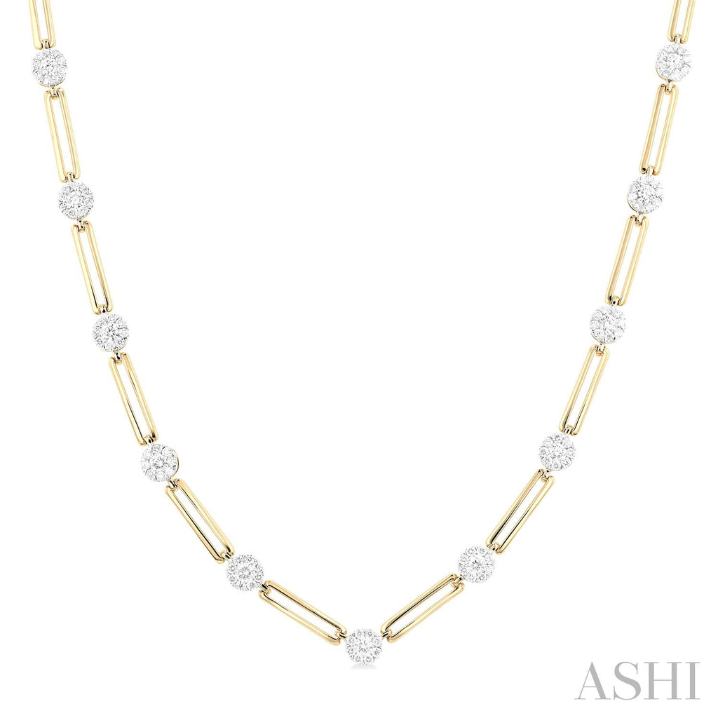 Gold paperclip chain necklace with round diamonds.