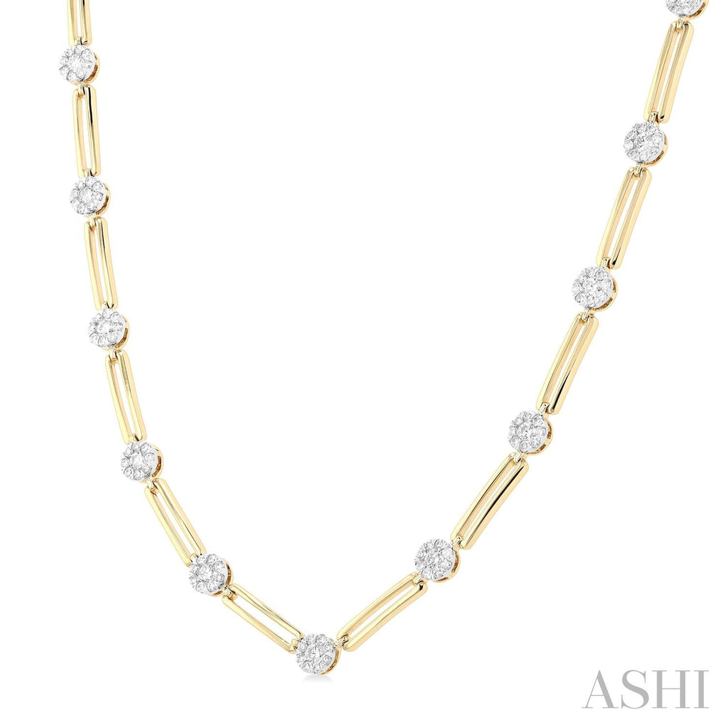Gold paperclip chain necklace with diamonds.