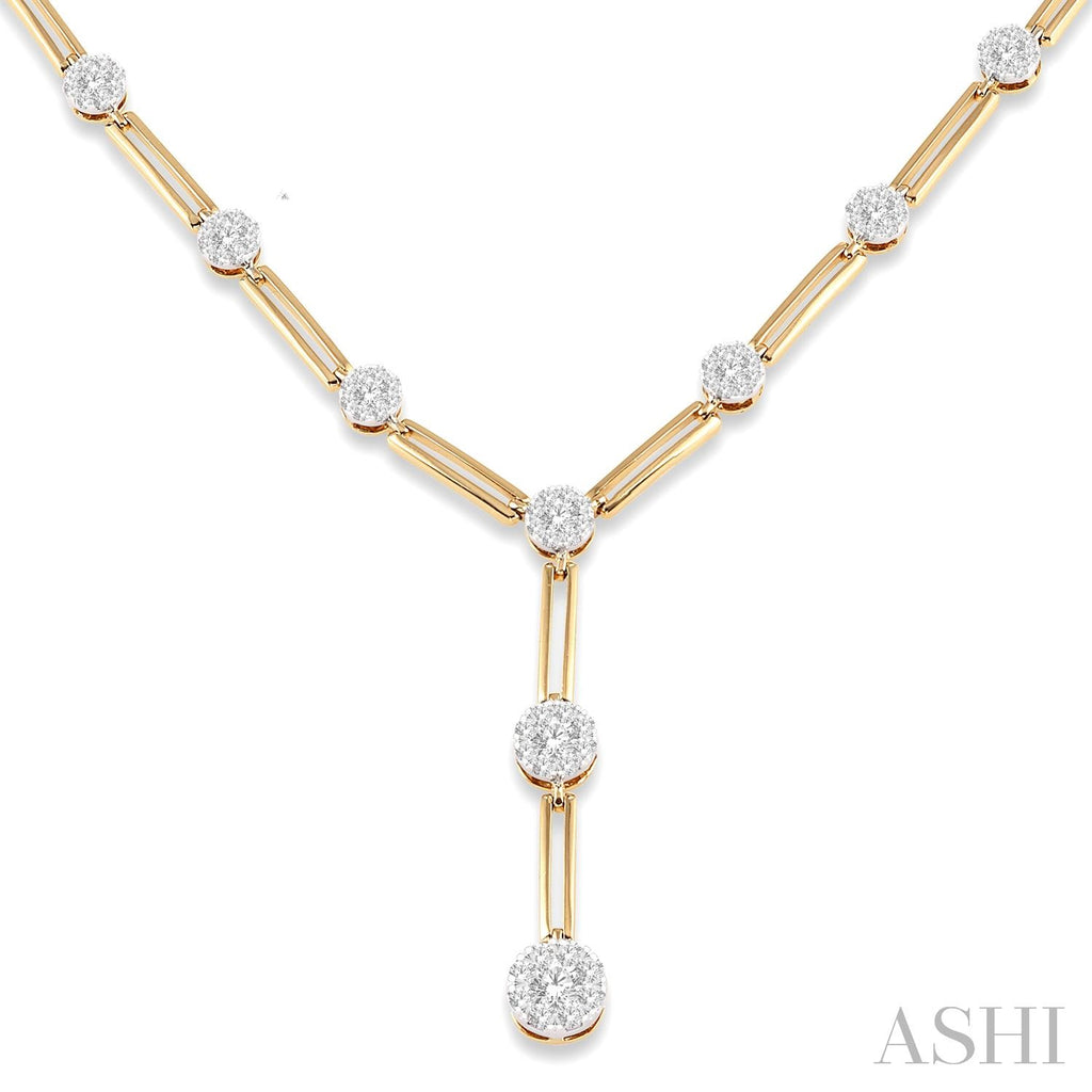 Diamond necklace with gold paperclip chain.