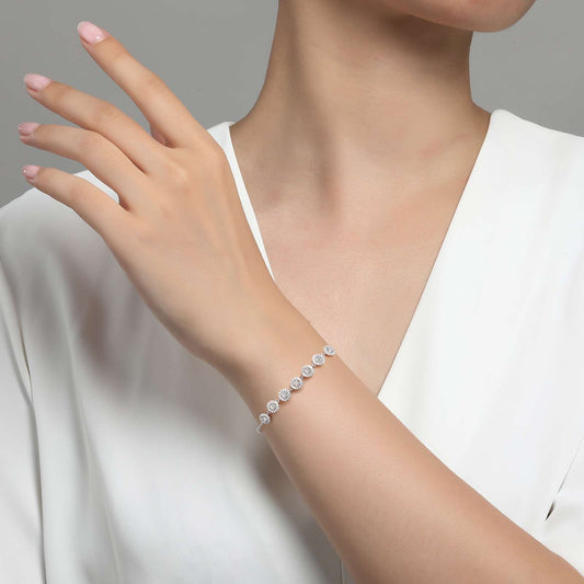 Simulated diamond bracelet on wrist.