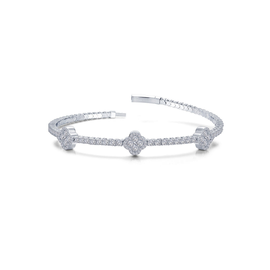 Simulated diamond bangle with floral design.