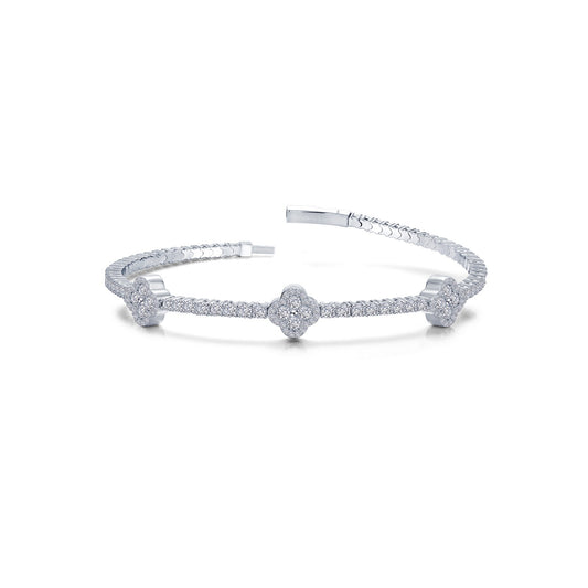 Simulated diamond bangle with floral design.