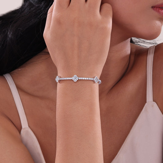 Simulated diamond bangle on woman's wrist.