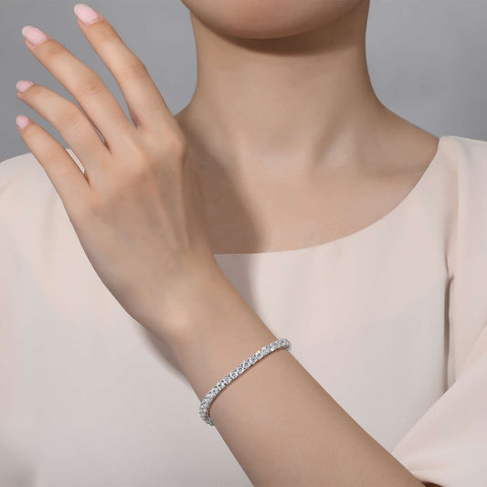 Simulated diamond bracelet on woman's wrist.