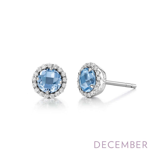 Blue topaz stud earrings with diamond halo.