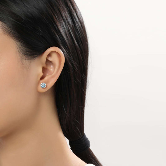 Blue topaz stud earrings in silver.