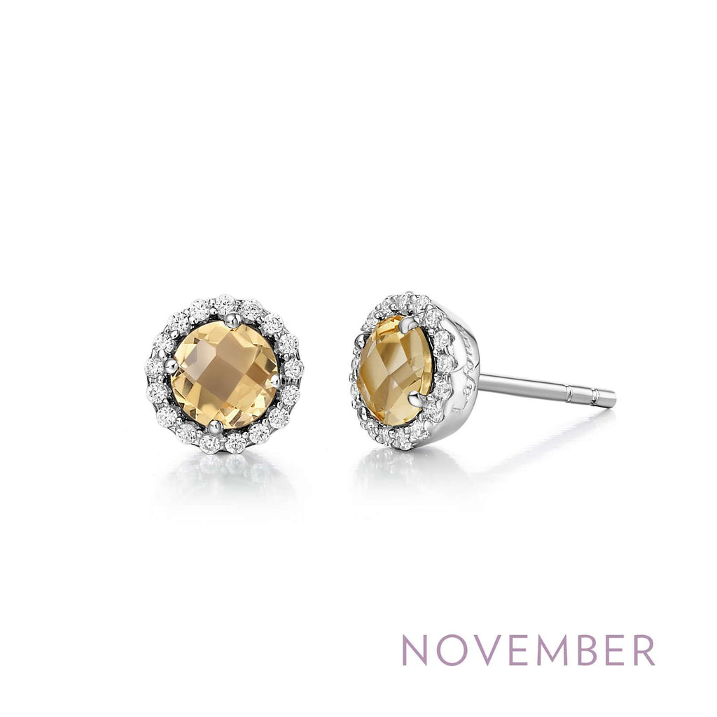 Round citrine earrings with diamond halo.