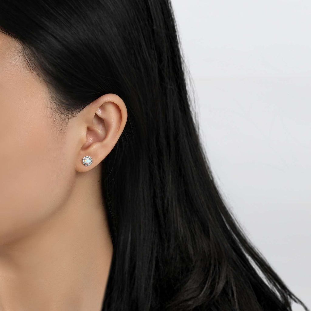 Simulated opal earrings in platinum-bonded silver.