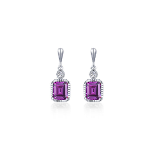 Emerald-colored alexandrite earrings with diamond accents.