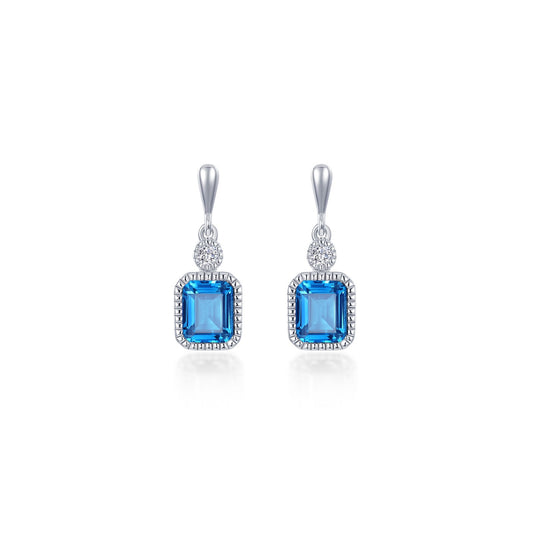 Emerald-cut blue topaz earrings.