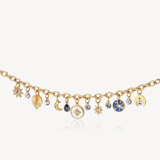 Gold necklace with celestial charms and gemstones.