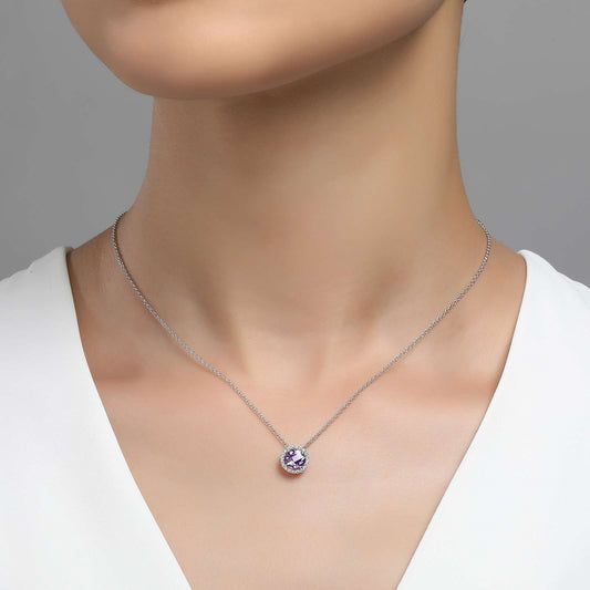 Round Amethyst pendant on silver chain.