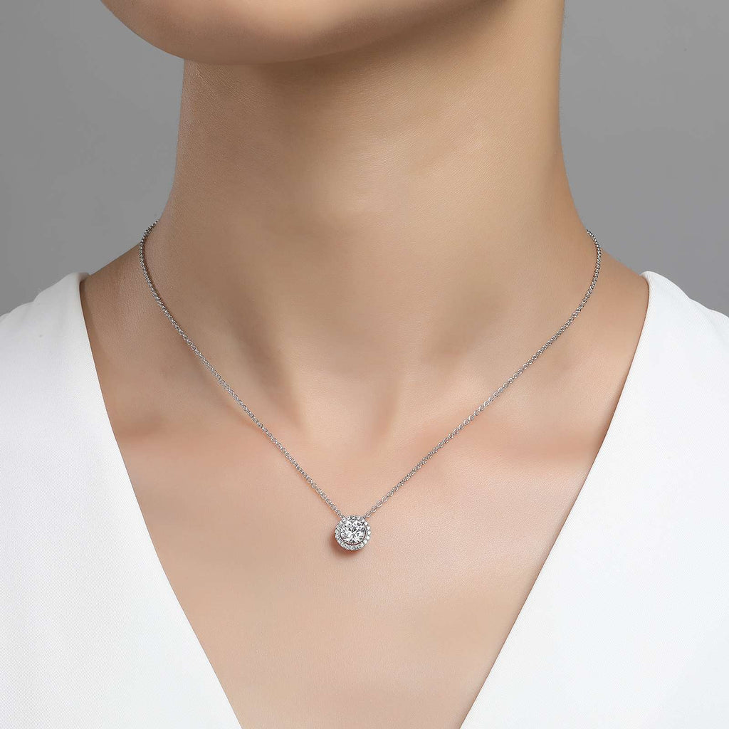 Simulated diamond pendant on silver chain.